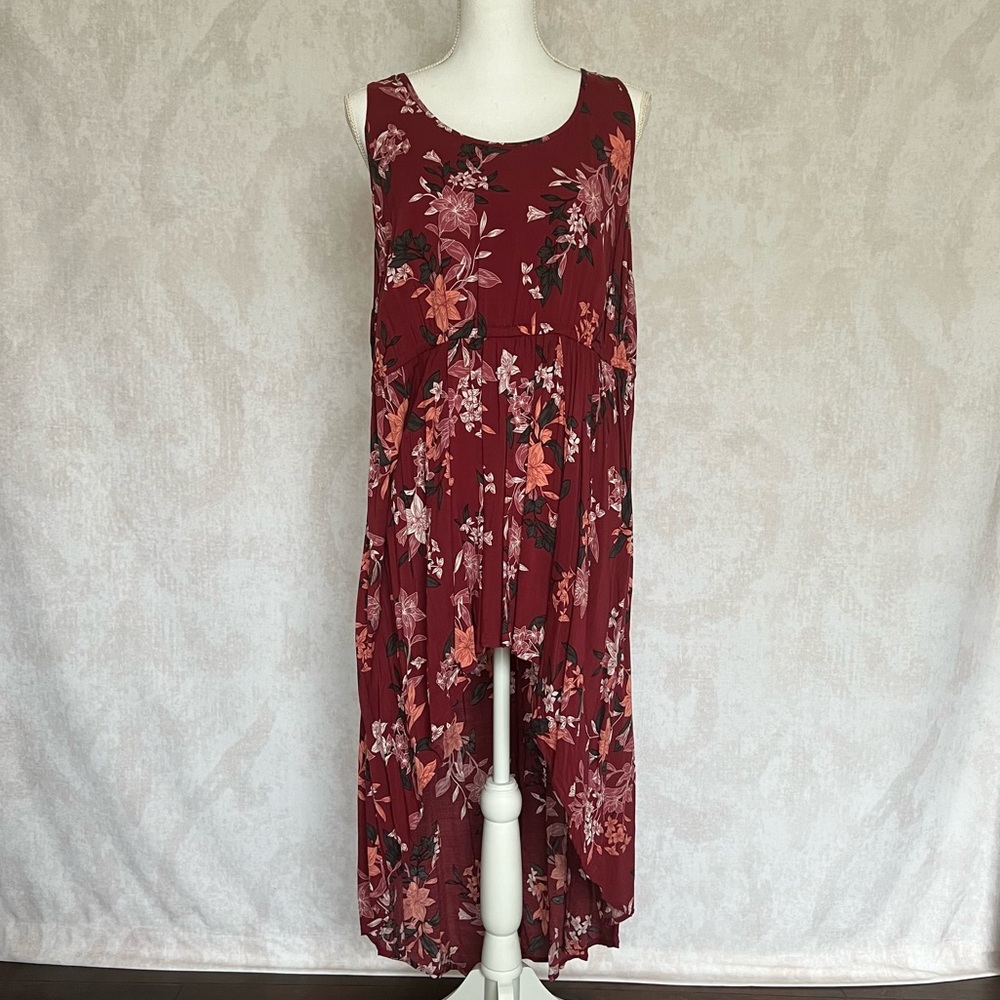 Women’s High-Low Burgundy Top with Floral Print in a Plus Size 1X.